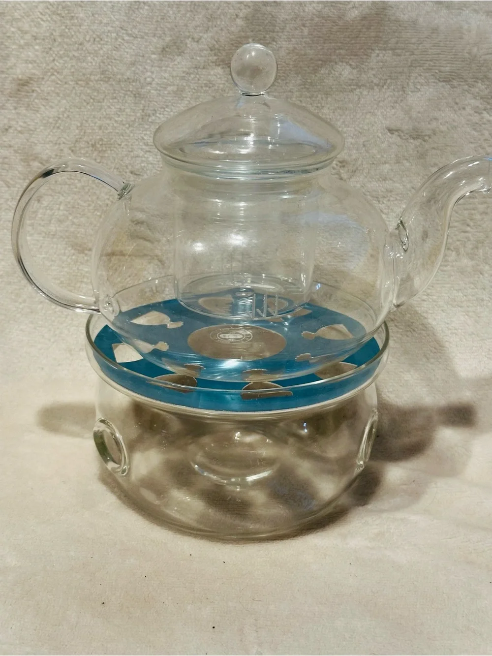 Shou Gong 27 oz glass filtering tea maker teapot with a warmer and 6 tea cups